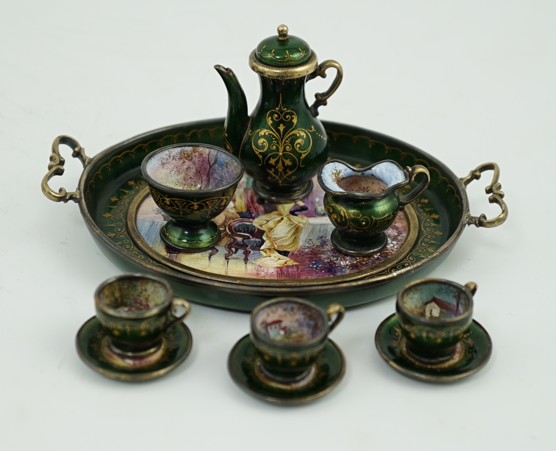 A cased late 19th century Viennese silver and polychrome enamelled miniature thirteen piece tea service, by Ludwig Politzer